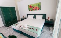   Olympion Melathron Hotel & Bungalows 3*  8