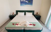   Olympion Melathron Hotel & Bungalows 3*  6